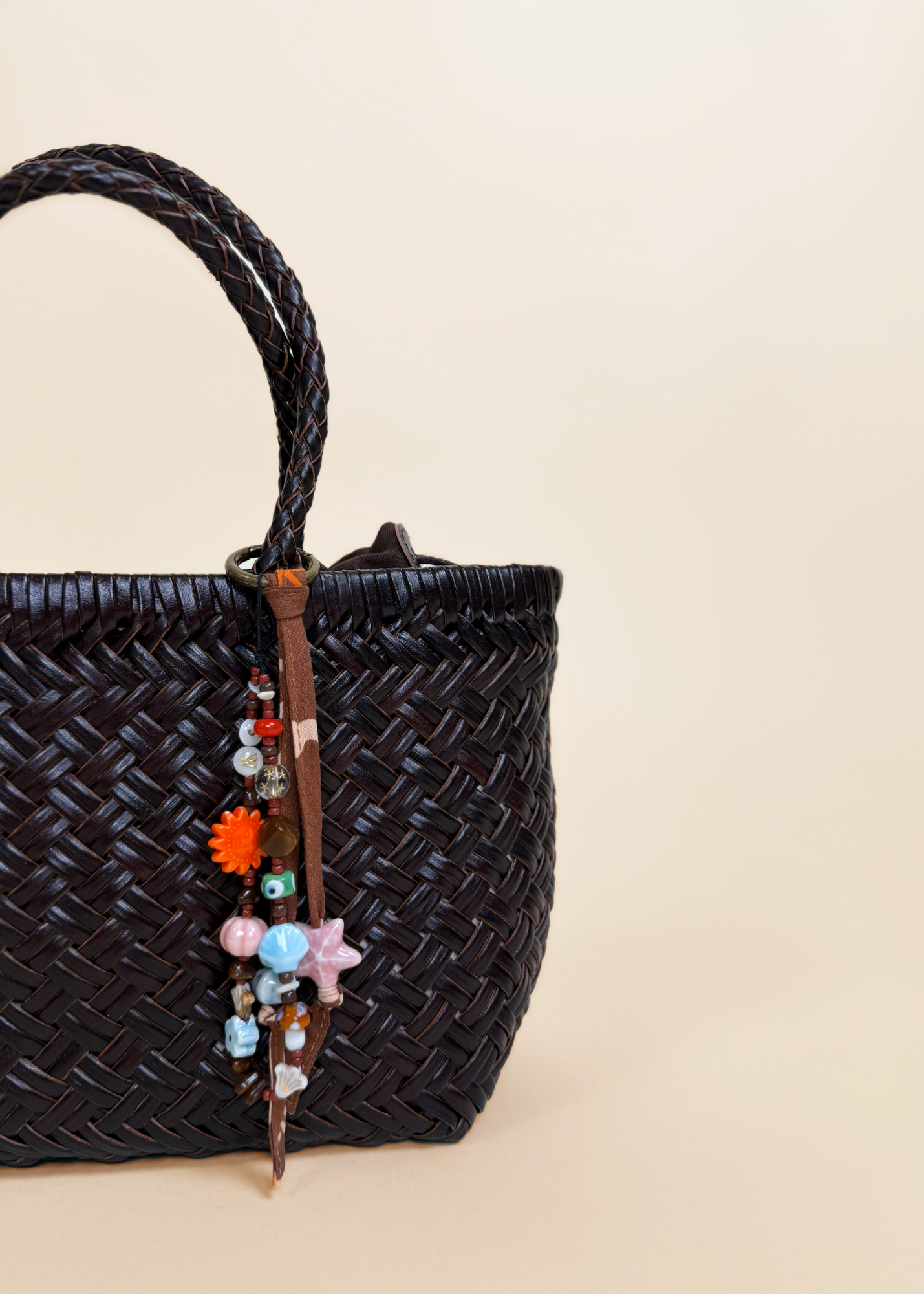 LEATHER MINI WOVEN BAG - BROWN