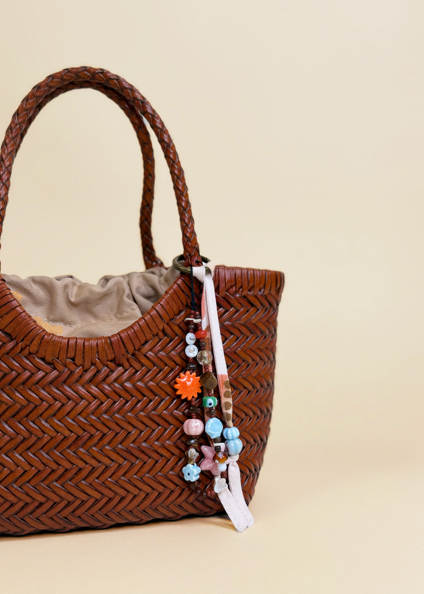 LEATHER MINI WOVEN BAG - TERRACOTTA